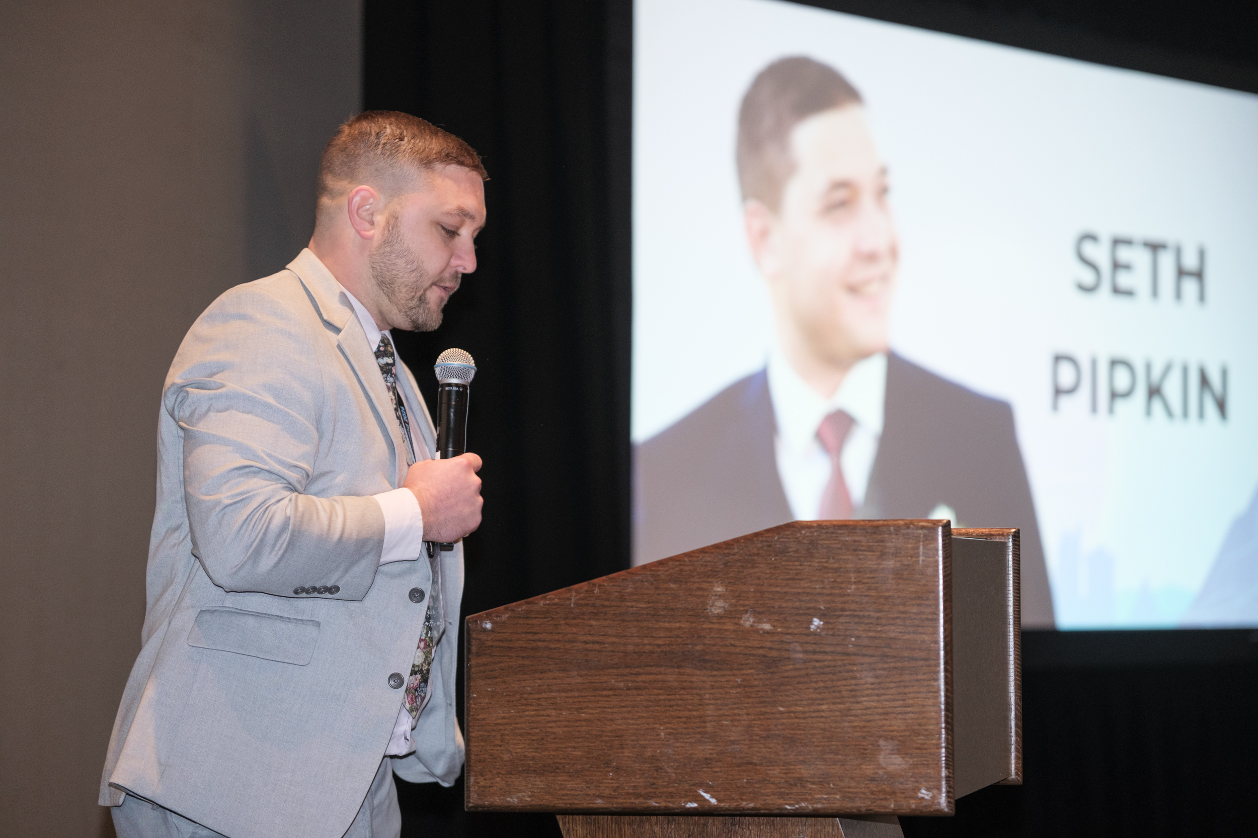 Zenith leader presenting at a professional event